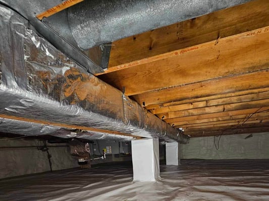 HVAC vents running through an encapsulated crawl space.