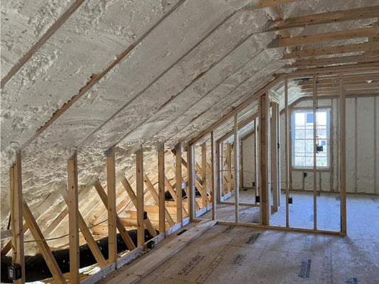 An attic encapsulated with open cell spray foam insulation.
