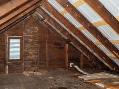 An attic in Chambersburg, PA with all existing insulation removed.