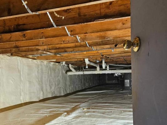 An encapsulated crawl space in southern Pennsylvania with the door open.