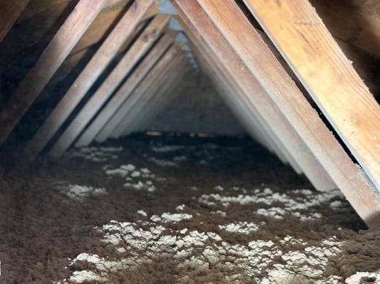 Blown-in cellulose insulation in an attic in Fairfield, PA.
