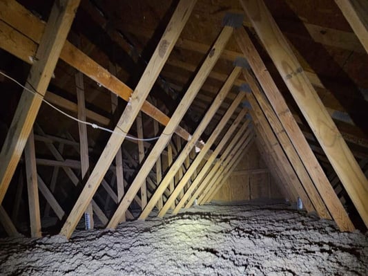 An attic in Smithsburg, MD, insulated with blown-in cellulose on the attic floor.