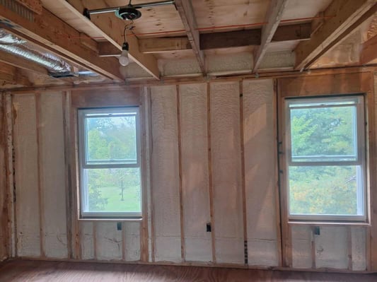 A wall in a new construction home in Carroll County, MD, insulated with spray foam.