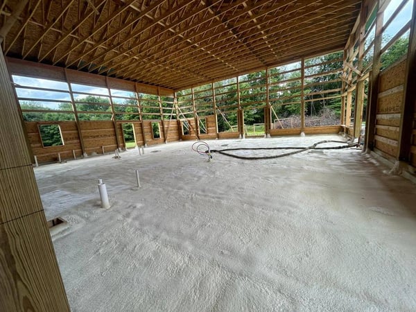 The underslab of a new construction home in Homer City, PA. This closed cell spray foam prevents cold air from infiltrating through the ground.