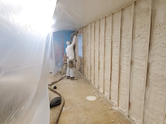 Exterior walls insulated with closed cell spray foam insulation.