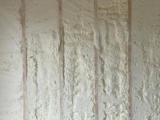 Open cell spray foam in an exterior wall in Fayetteville, Pennsylvania.