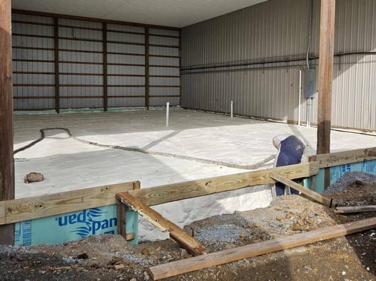 Expansive metal building, insulated with closed cell spray foam on the underslab.