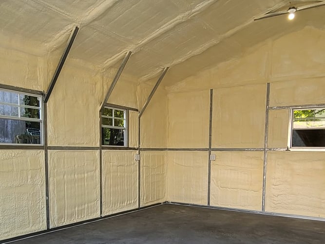 Metal structure insulated with spray foam